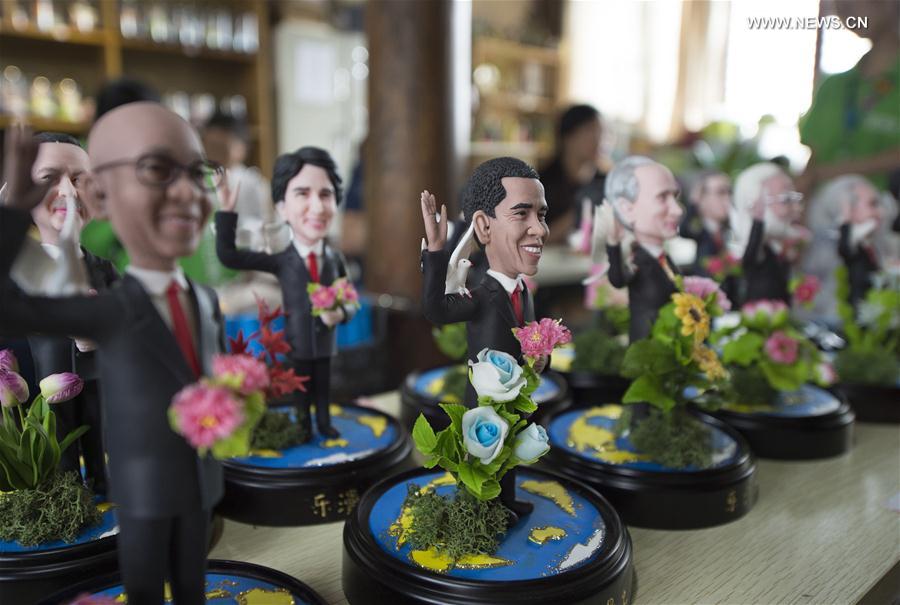 Clay figures featuring the leaders to attend the upcoming G20 Summit are seen in Hangzhou, capital of east China`s Zhejiang Province, Sept. 1, 2016. Made by artist Wu Xiaoli with the name 